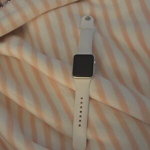 Apple Watch Series 1 38mm with white band and charger